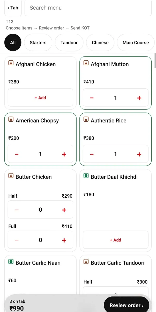 Table T12 ka menu: Choose items → Review order → Send KOT, Afghani Mutton, American Chopsy aur Authentic Rice ek-ek, neeche 3 on tab ₹990 aur Review order